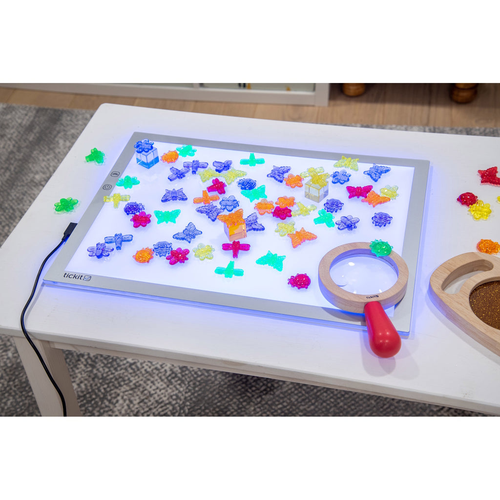 A medium-sized LED panel with adjustable color-changing lights, perfect for sensory exploration, color mixing, and visual learning activities.