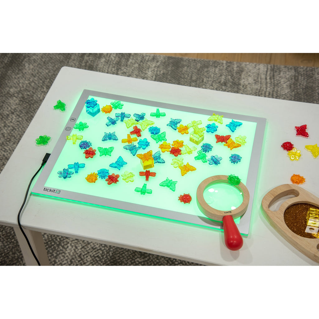 A medium-sized LED panel with adjustable color-changing lights, perfect for sensory exploration, color mixing, and visual learning activities.