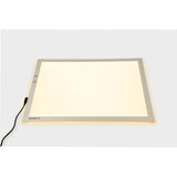 A medium-sized LED panel with adjustable color-changing lights, perfect for sensory exploration, color mixing, and visual learning activities.