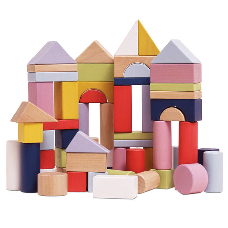 Colorful wooden building blocks arranged to form castle structures.