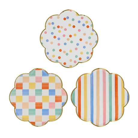 Three colorful scalloped side plates with gold rims featuring polka dot, checkered, and striped patterns.
