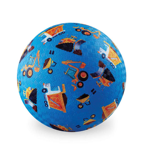 Blue kids playground ball featuring yellow construction trucks and dump trucks on textured rubber.