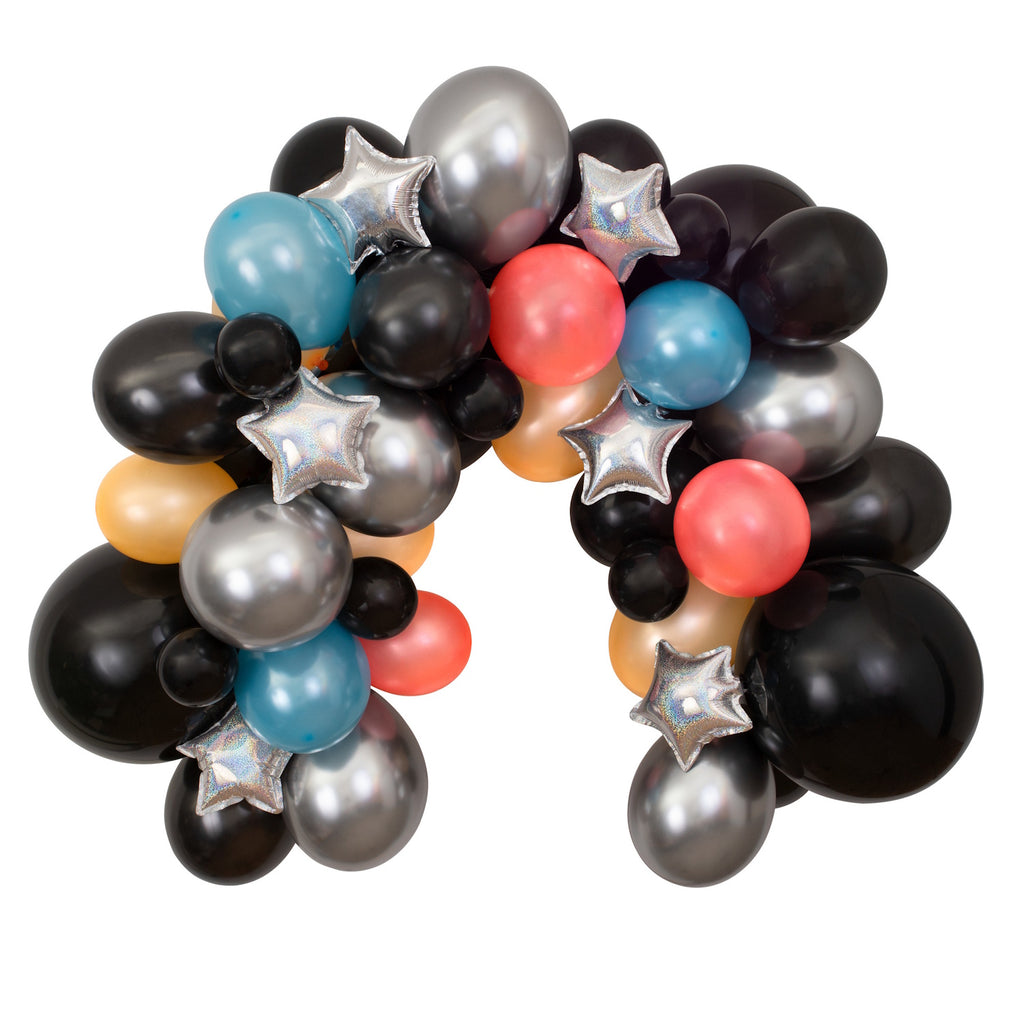 Featuring a mix of metallic and matte balloons in space-themed colours, complete with star and planet detail - perfect for a cosmic party atmosphere.