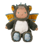 Dinkum Doll Cozy Day Flint plush toy in a green dragon costume with wings and shimmery feet.