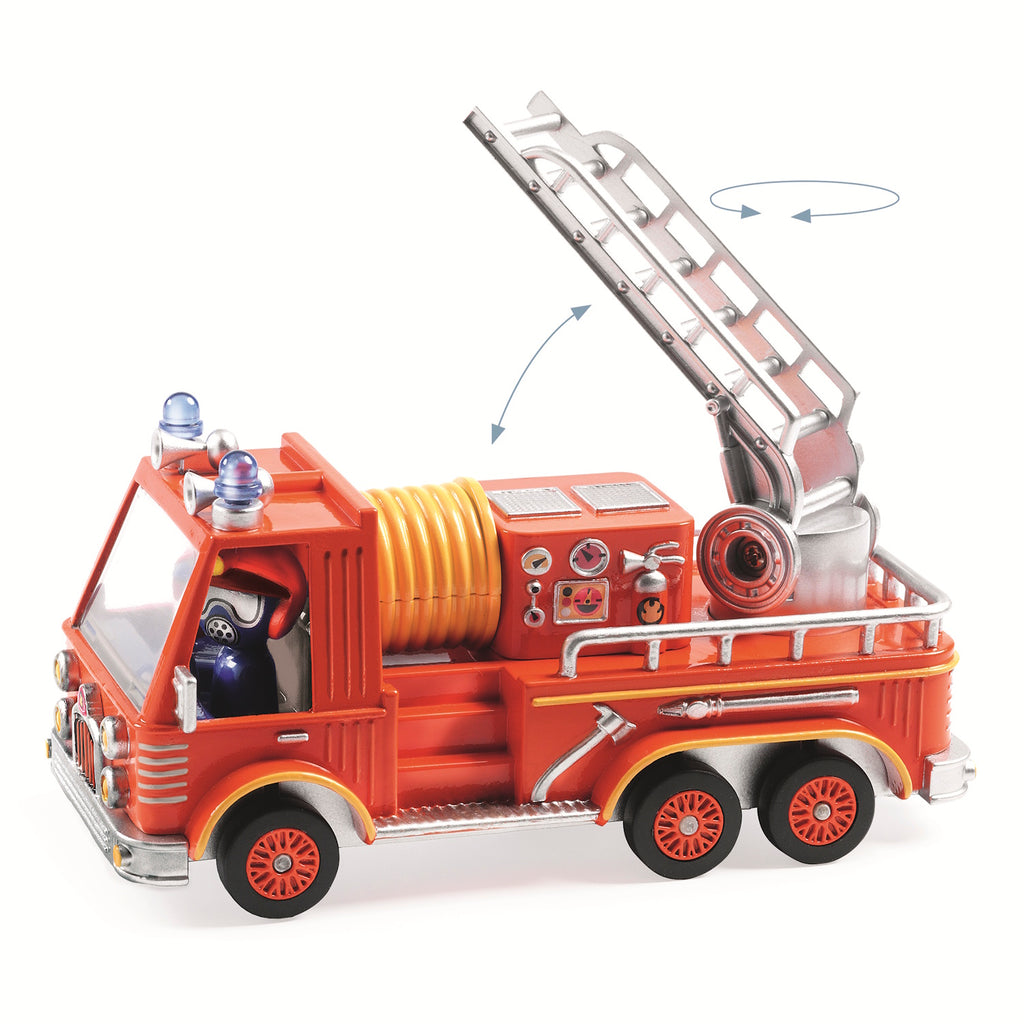 This metal fire truck features a movable ladder and a driver with a rotating head, adding to its interactive appeal.
