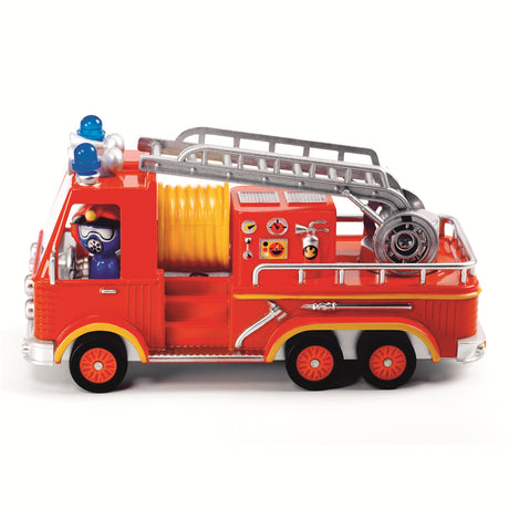 This metal fire truck features a movable ladder and a driver with a rotating head, adding to its interactive appeal.