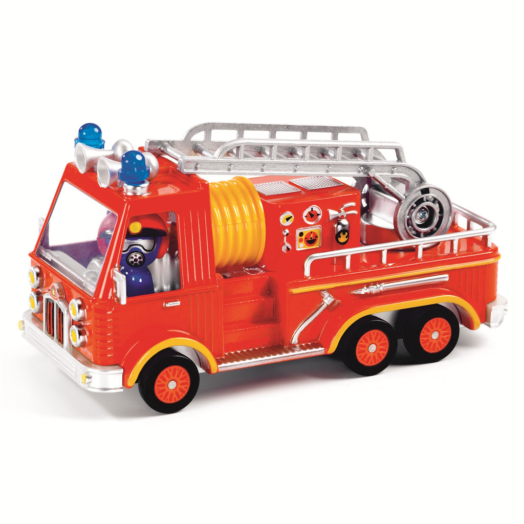 This metal fire truck features a movable ladder and a driver with a rotating head, adding to its interactive appeal.