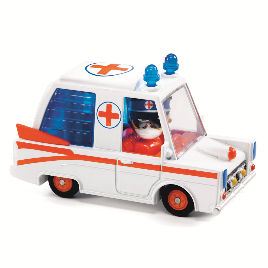 The ambulance is crafted from metal with a distinctive, colorful design. It includes a pilot character whose head can rotate, adding to the interactive play experience.