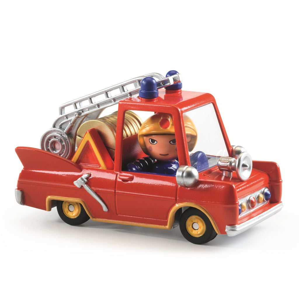 A bright red toy fire truck with a ladder, hoses, and emergency lights, featuring a driver in a blue uniform.