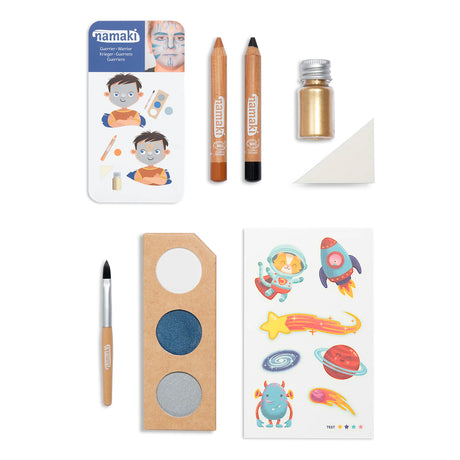 Namaki Intergalactic Worlds face paint kit contents, including face paint palette, paintbrush, two coloured pencils, gold glitter, stencil, and space-themed temporary tattoos