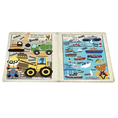 An open cloth children's book featuring illustrated construction vehicles on the left and boats on the right.