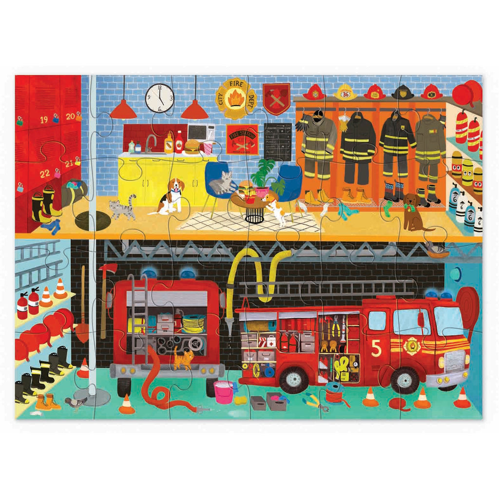 Colorful illustration of a fire station. Upstairs, three dogs and two cats roam among lockers, gear, and a kitchen area. Below, a red fire truck is surrounded by hoses and equipment. The scene is lively and detailed, with a sense of readiness and community.