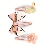 Dance collection girls hair clips set with swan, polka dot bow, and flower on pink snap clips.