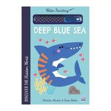 Cover of "Deep Blue Sea" water painting book shows a smiling shark with vibrant stripes surrounded by colorful fish and coral on a light blue background.