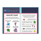 Open book displaying a colorful memory game about marine life on the left. Illustrations include a blue starfish, pink seahorses, a baby turtle, and a purple octopus. The right page provides fun facts about sea creatures like clownfish, sea turtles, squid, seahorses, and parrots, creating an engaging and educational tone. A water marker pen is visible in a holder above the left page.