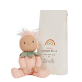 Olli Ella Dinky Dinkums Peggy Peach doll sitting next to its paper bag packaging.