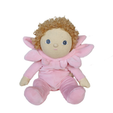 Dinky Dinkum Magnolia doll with curly blonde hair in a pink flower costume against a white background.