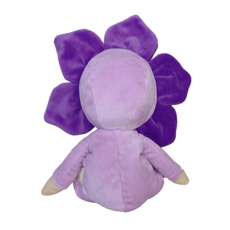 Back view of a plush violet flower doll in a light purple body suit on a white background.