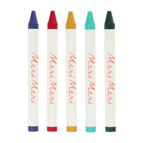 Five colorful crayons in blue, red, yellow, turquoise, and dark green with Meri Meri branding.