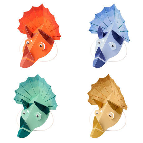 Four colorful 3D paper dinosaur party masks in orange, blue, green, and yellow with head frills.