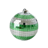 A spherical ornament covered in metallic green and silver tiles, resembling a disco ball, set against a white background. Reflective and festive.