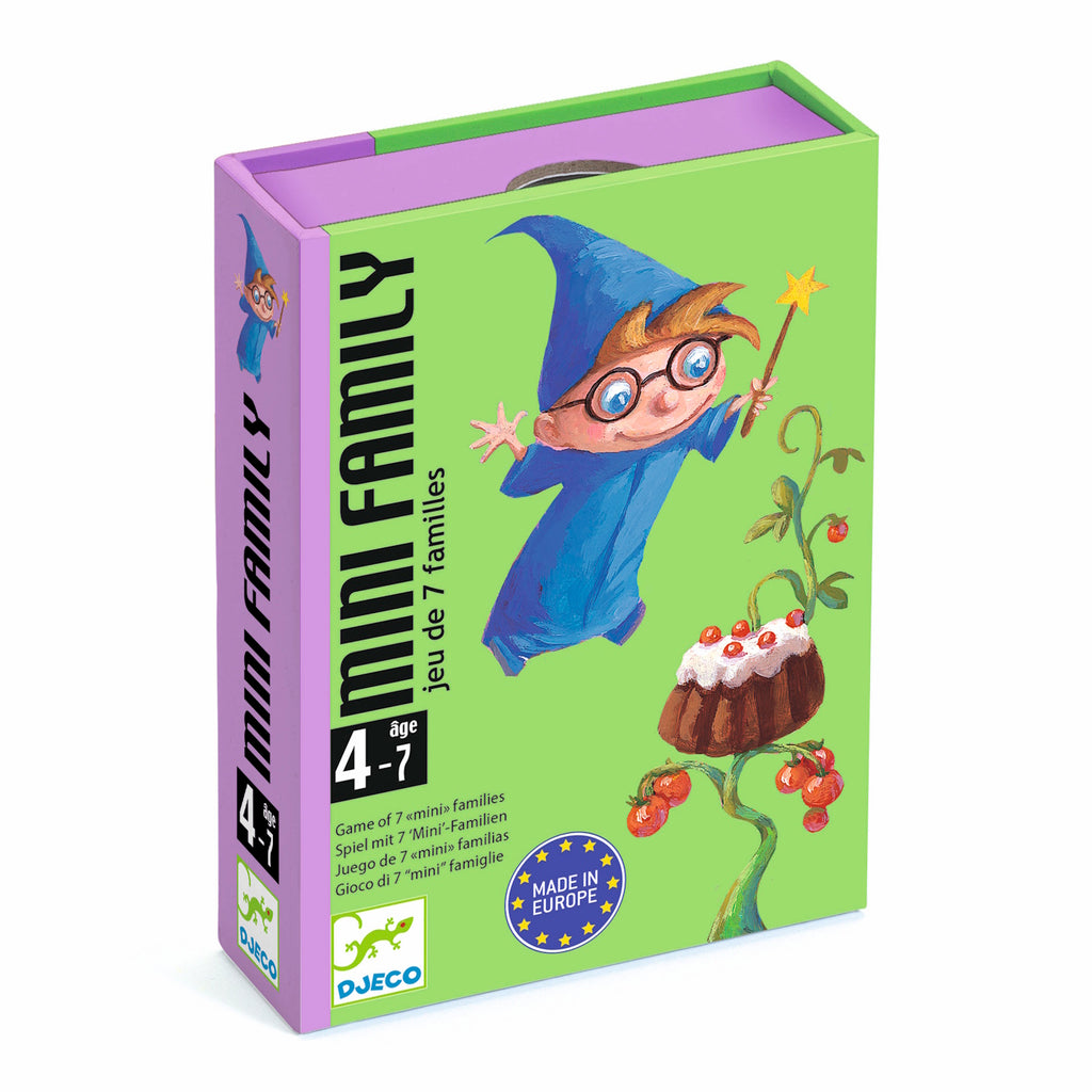 Illustration of a whimsical wizard in a blue robe holding a star wand, with a cake and vine on a green background. Box labeled "Mini Family," ages 4-7.
