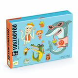 Blue game box titled "TOKTOOYOU" for ages 6-99. Features playful illustrated animals: a shark with glasses, a monkey, a crocodile, and various quirky characters.