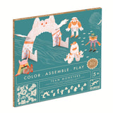 Box of Djeco DIY paper monster figures for kids aged 5+, featuring colorful, whimsical monster designs against a teal background. Text reads "Color, Assemble, Play."