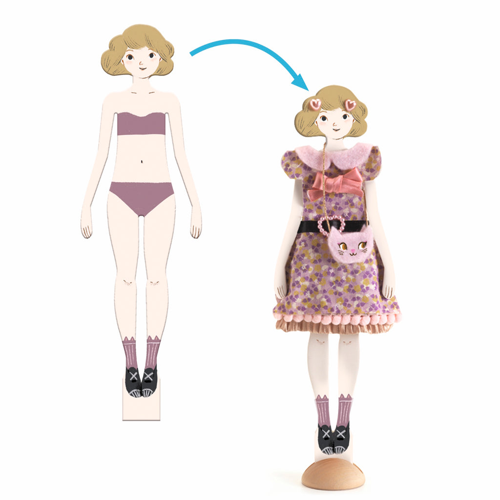 Three stylish dolls stand on wooden bases, each showcasing unique outfits with vibrant colors and playful accessories.