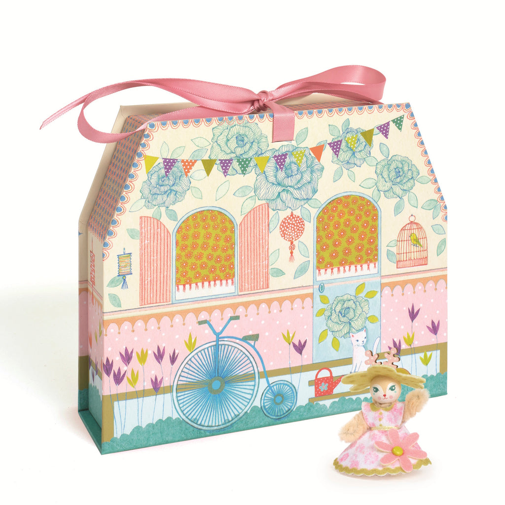 A DIY craft kit featuring a charming miniature house that children can decorate and assemble with detailed accessories for imaginative play.