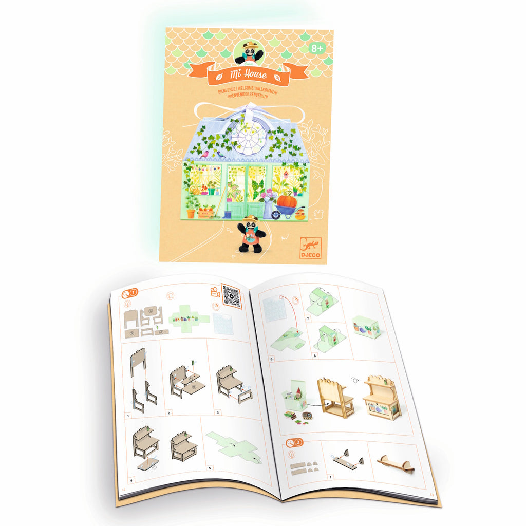 A DIY craft kit with a cute miniature house and furniture for kids to decorate and personalize, creating their own imaginative dollhouse.