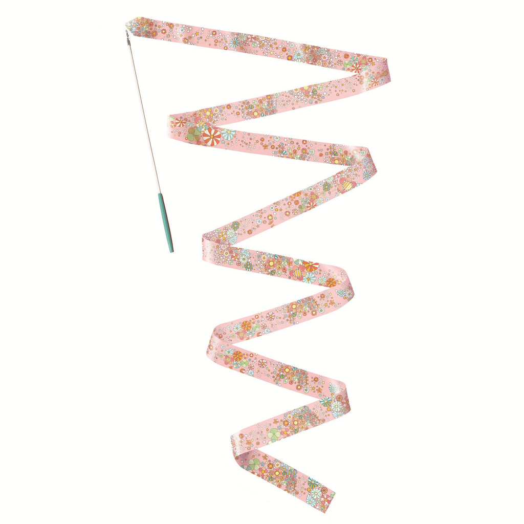 A pink ribbon with a floral pattern is attached to a wand with a teal handle. The ribbon flows in a zigzag pattern on a white background.