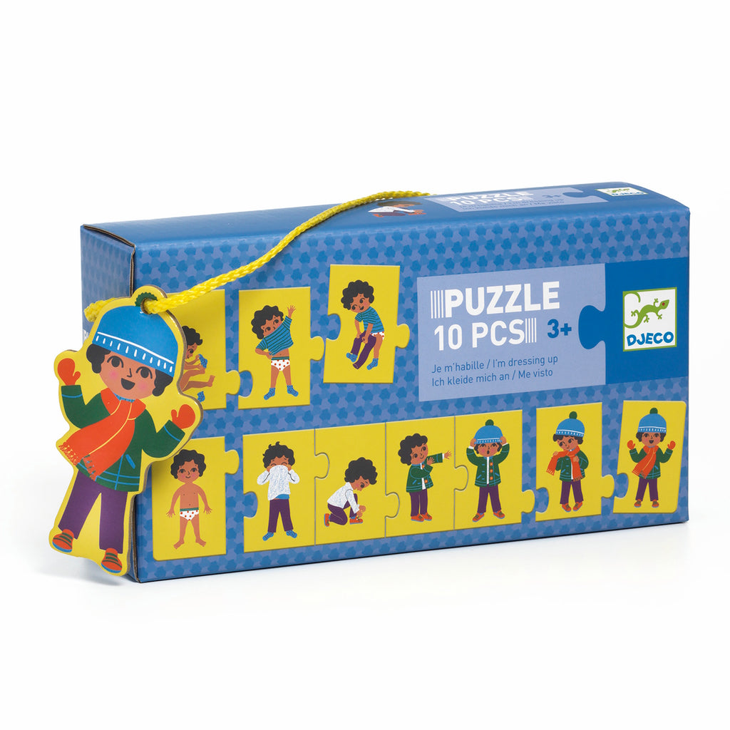 Box of Djeco's "I'm Dressing Up" puzzle for ages 3+, showing colorful images of a child dressing, with a playful and engaging design.