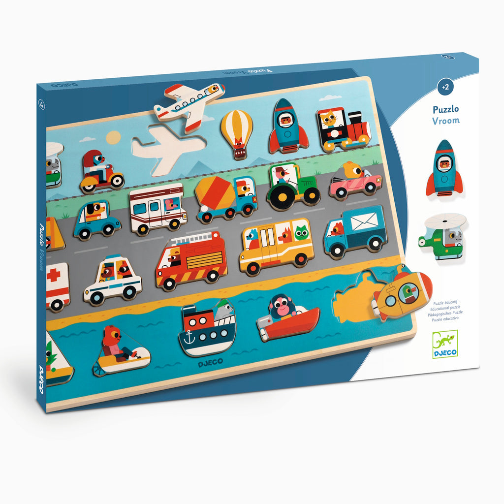 Toy puzzle in a box featuring various whimsical vehicles, including rockets, cars, boats, and planes, set on colorful roads and waterways. Suitable for ages 2+.