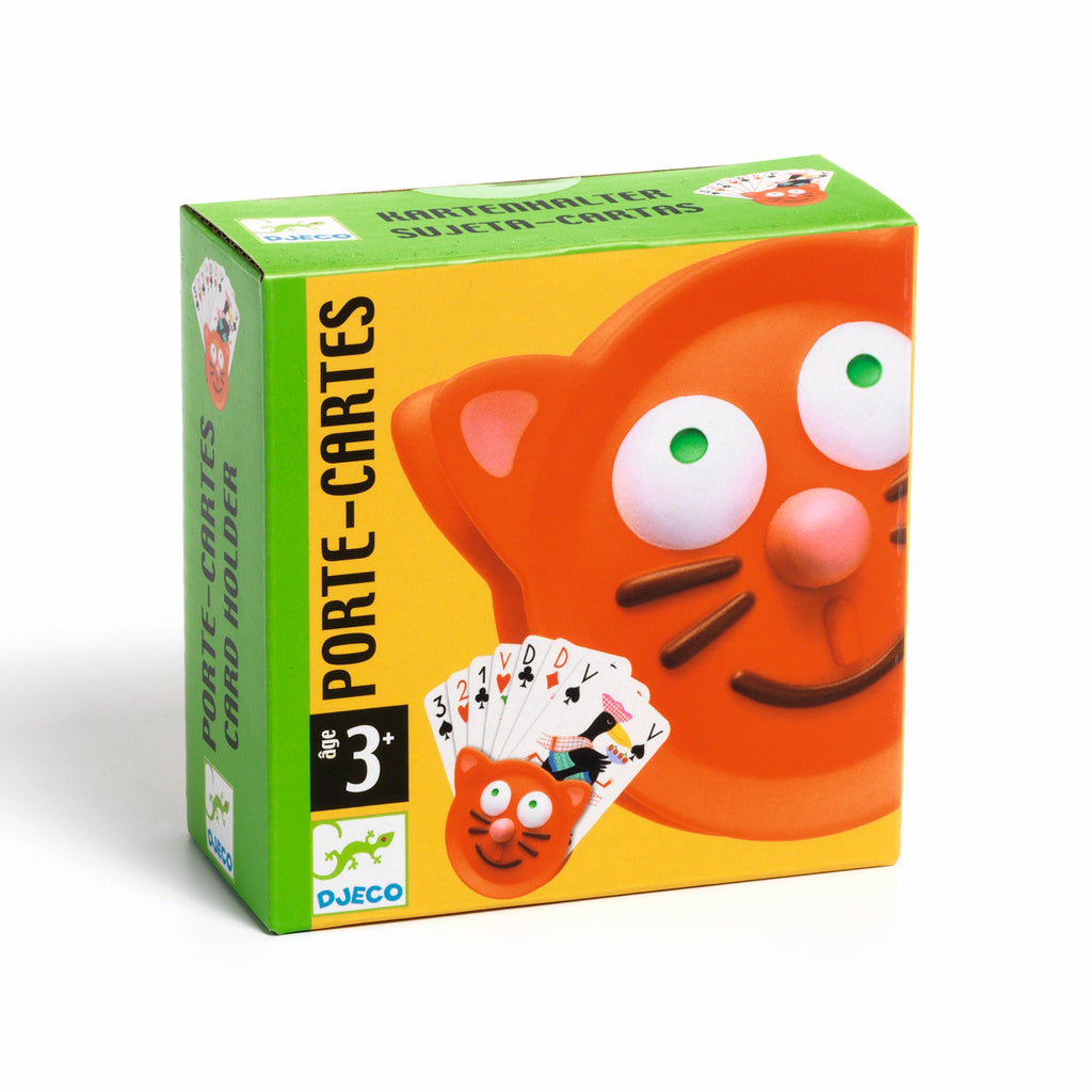 Brightly colored card holder packaging featuring a cartoonish orange cat face with wide eyes. Includes playing cards illustration. Suitable for ages 3+.