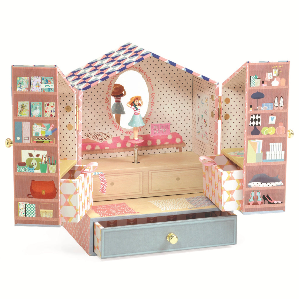 A colorful, open dollhouse wardrobe with patterned walls and shelves filled with miniature items. A doll spins in front of a mirror, creating a whimsical scene.