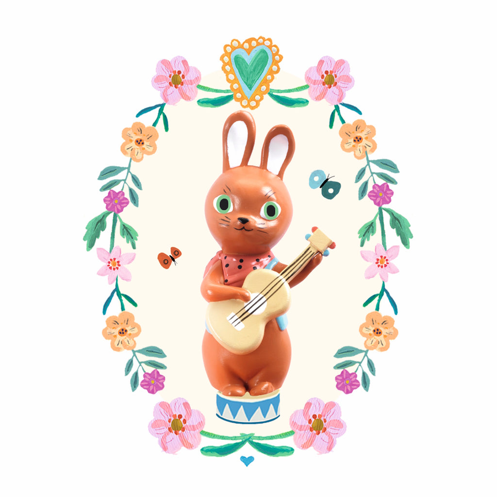 Equipped with a wind-up mechanism, the music plays when the lid is opened, and a small rabbit figurine spins as the melody plays.