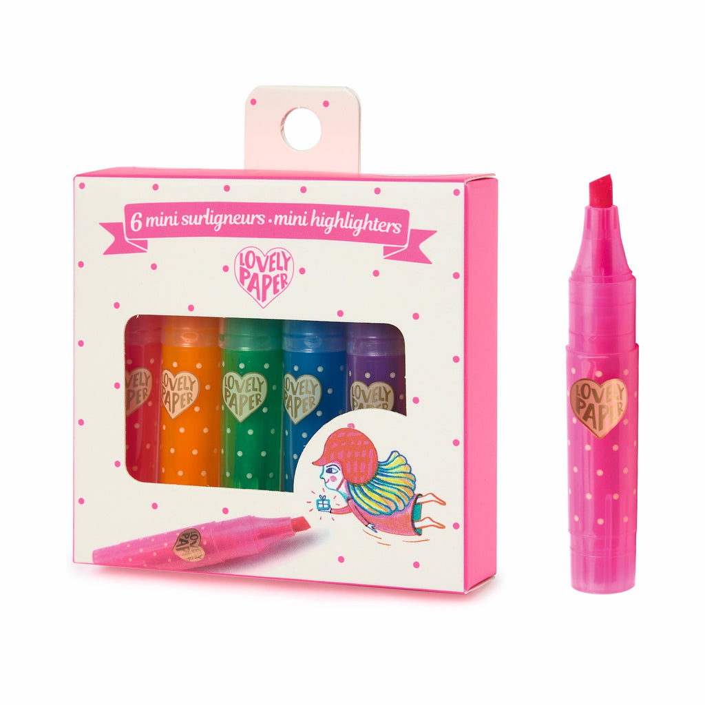 Box of six mini highlighters in rainbow colors with polka dots, labeled "Lovely Paper." One pink highlighter stands upright beside the box.