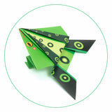 A craft kit featuring colorful paper designs and folded animal shapes like frogs and kangaroos that can hop when pressed.
