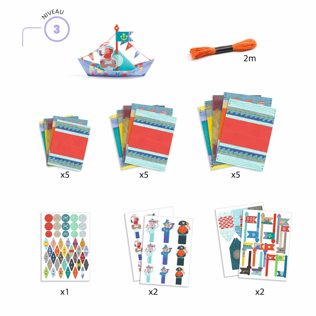 With brightly colored, coated paper boats designed to float on water after folding.