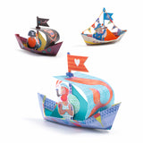 With brightly colored, coated paper boats designed to float on water after folding.