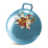 A blue space hopper features a retro superhero design. The superhero, in red and yellow, is surrounded by rockets, stars, and planets, conveying a playful, adventurous theme.