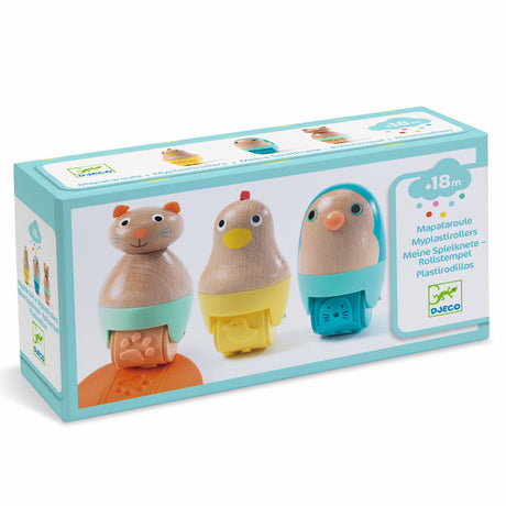 Three wooden rolling pins featuring animal designs - typically a bird, a fish, and a cat.