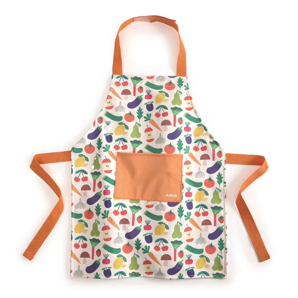 Colorful apron with orange straps and pocket, featuring a playful pattern of assorted vegetables like carrots, tomatoes, and eggplants on a white background.