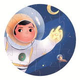A colorful puzzle featuring an astronaut floating in space alongside a playful cat, set against a vibrant blue cosmic backdrop.
