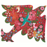 Colorful bird-shaped puzzle featuring vivid floral patterns, bright blossoms, and green leaves on a red background. A turquoise bird is central.