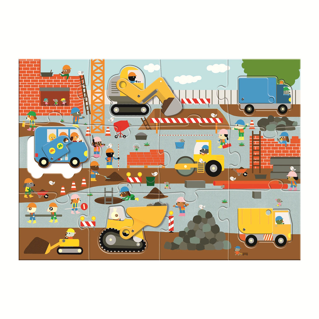 A giant jigsaw puzzle titled "Construction Site" featuring a detailed illustration of a bustling construction site with various machinery and workers.