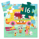 A 16-piece jigsaw puzzle titled "Ice Cream Truck" by Djeco, featuring a whimsical scene of a cat serving ice cream from a colorful truck in a park setting.