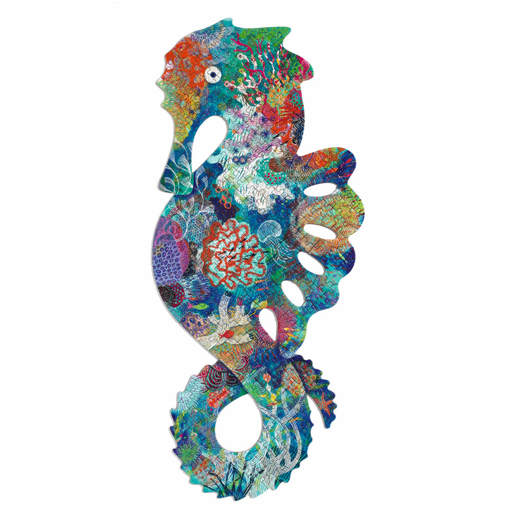 Colorful seahorse-shaped puzzle featuring intricate coral reef designs and patterns in vibrant blues, reds, and greens, conveying a lively marine theme.