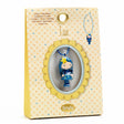 A colorful necklace featuring a finely sculpted figurine of Luz, a character from Djeco's Tinyly collection.